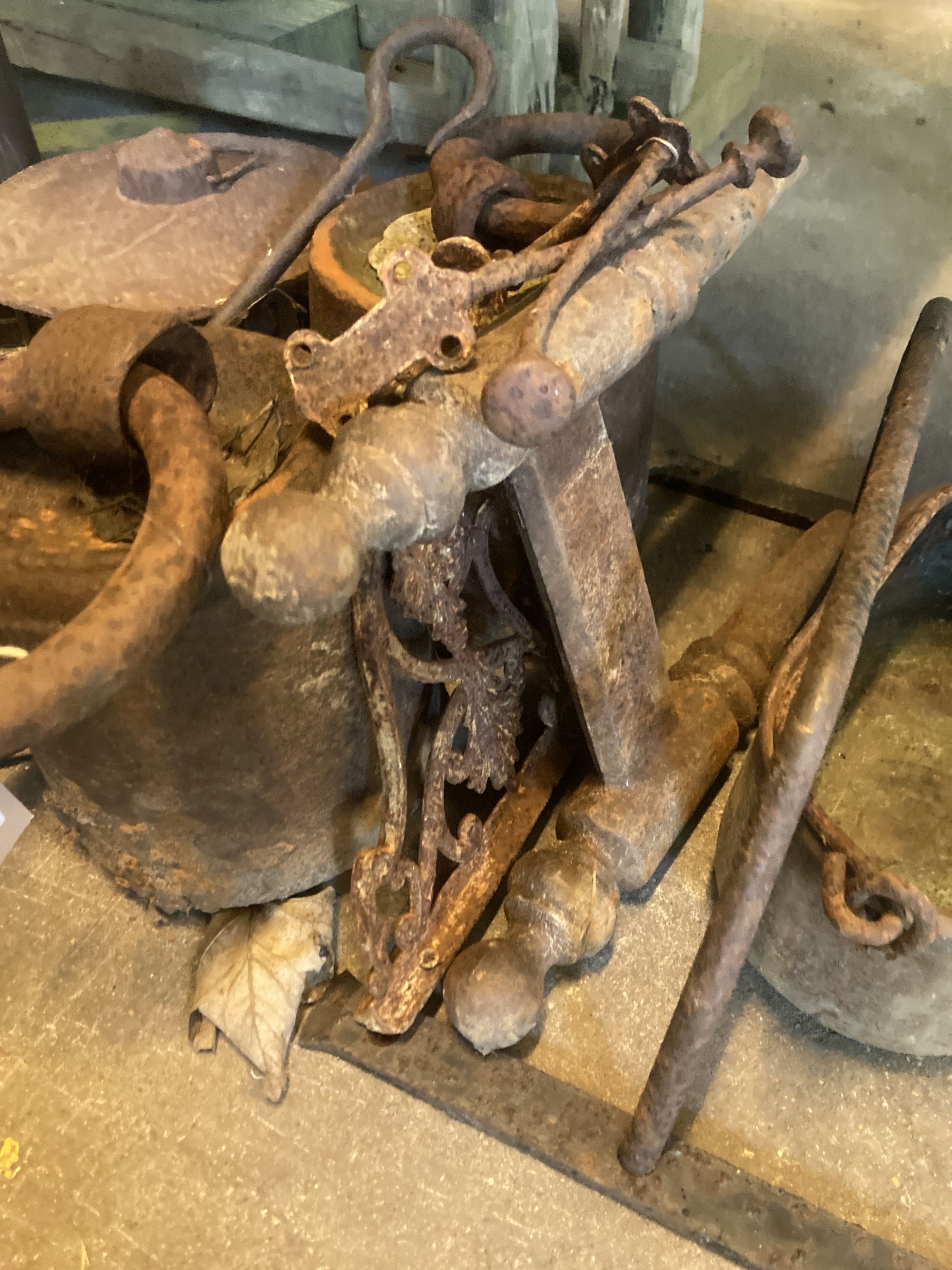A quantity of Victorian and later metalware to include a cow bell, lanterns, miners lamps etc.